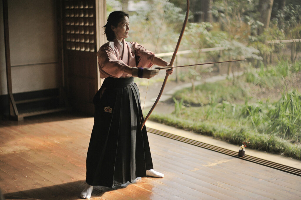 Woman with bow and arrow